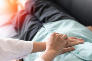 Patient with doctor checking on stomach diseases or gastropathy include gastritis, gastroparesis, diarrhea on senior old female person in hospital.