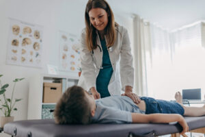 GI Specialist examines child stomach ache