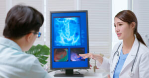 Doctor explain colon xray to patient