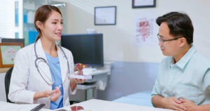 gastroenterologist consultation with a male patient